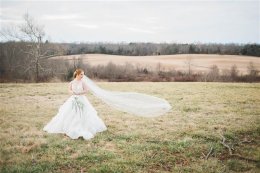 Model with Down syndrome presents for wedding ceremony photo shoot