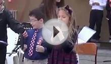 Kid Cant Stop Laughing While Reading A Poem During Ceremony